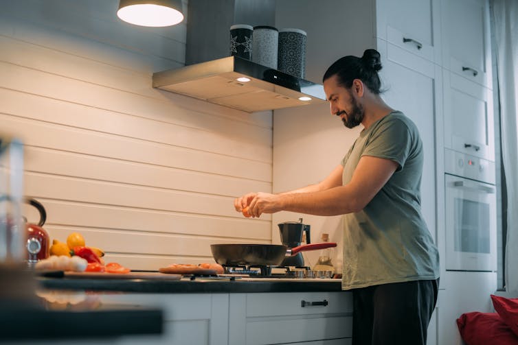 A person cooks food